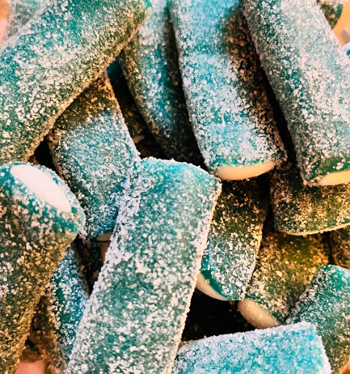 Blue raspberry rocketz. Fizzy sugar coated blue raspberry flavour sweet with a sugar paste filling